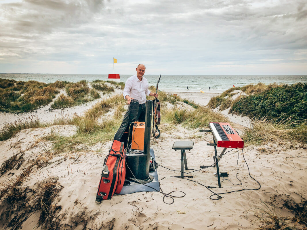 musician on the beach popup concert beach live music guitar duo