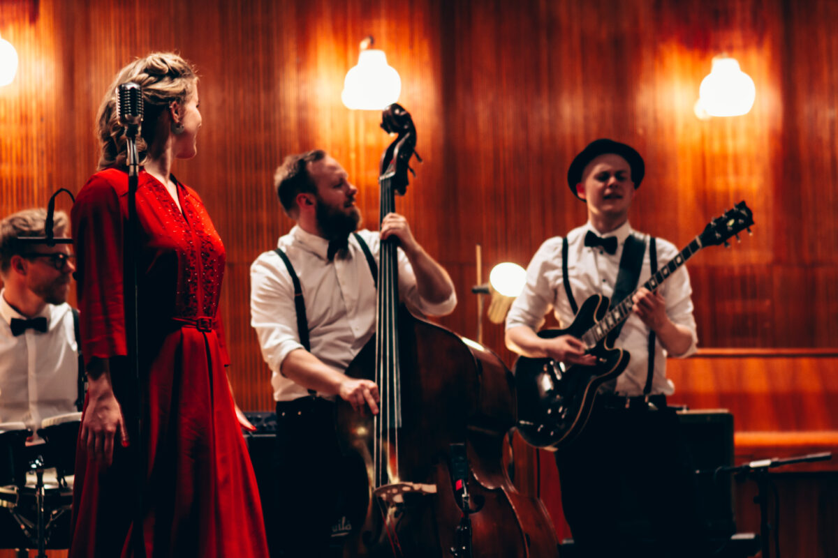 Festive band plays at Christmas party in cosy surroundings live music